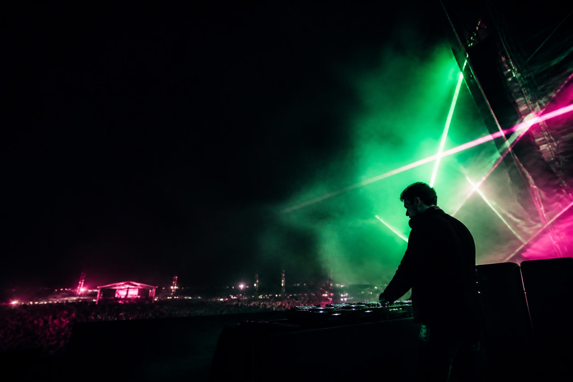 Paul Bingham DJ and electronic music producer performing at a festival mainstage